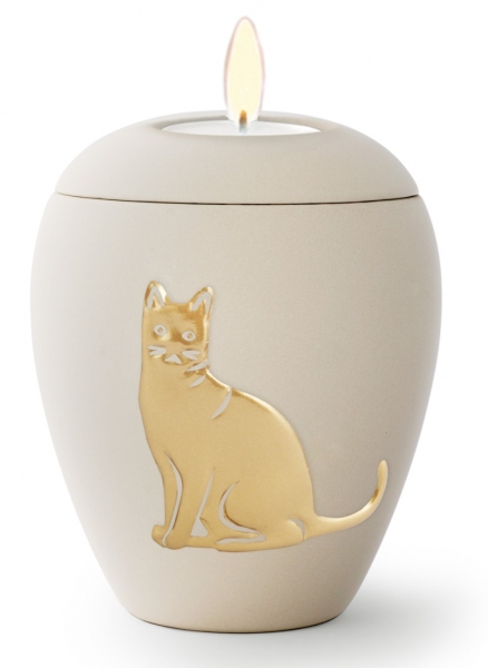 Tierurne aus samtener Keramik mit gold. Katzenrelief in cremé